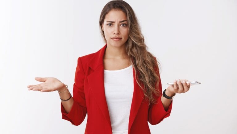 confused woman with smartphone.