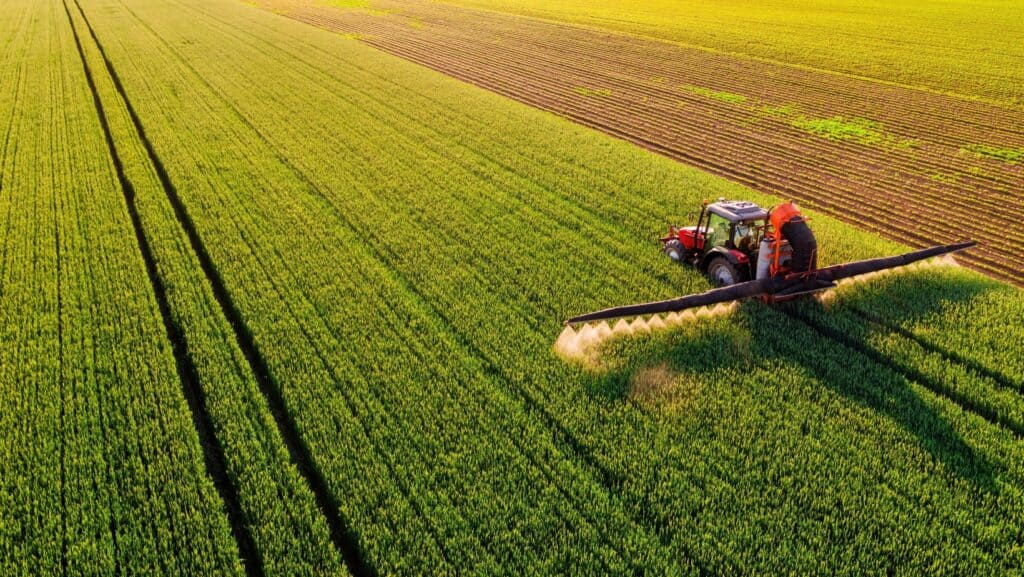 spraying pesticides.