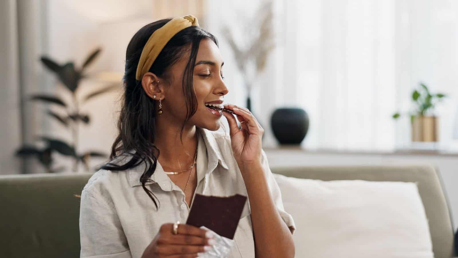 woman eating chocolate.