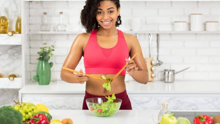 woman making salad.