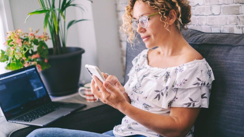 woman using phone.