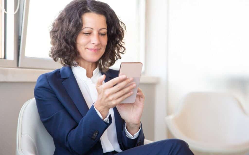 woman using smartphone.