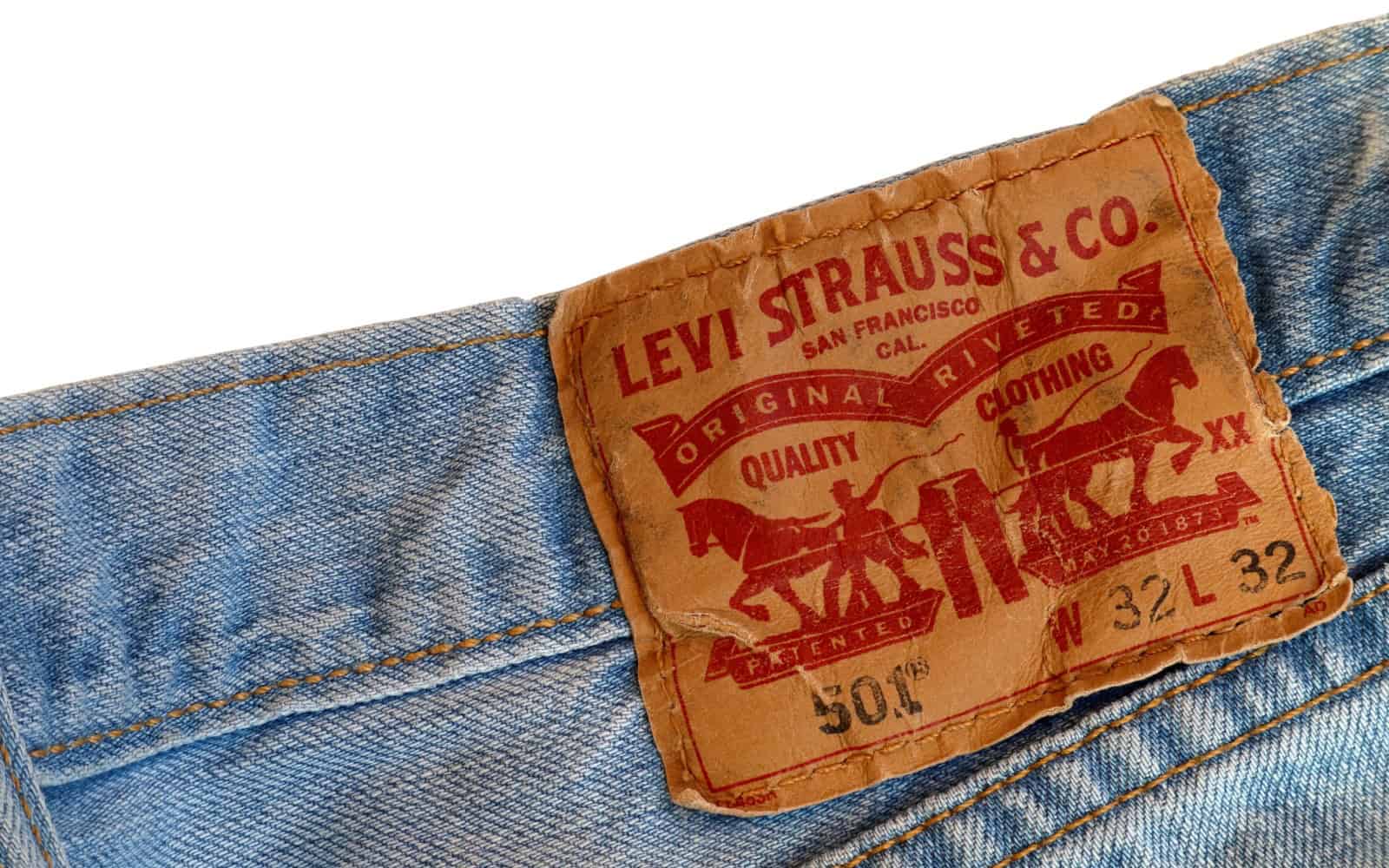 Stockholm, Sweden. September 04, 2021. Close up of a pair of old blue Levi Strauss jeans. Famous worldwide and international with great quality. Isolated on a white background.