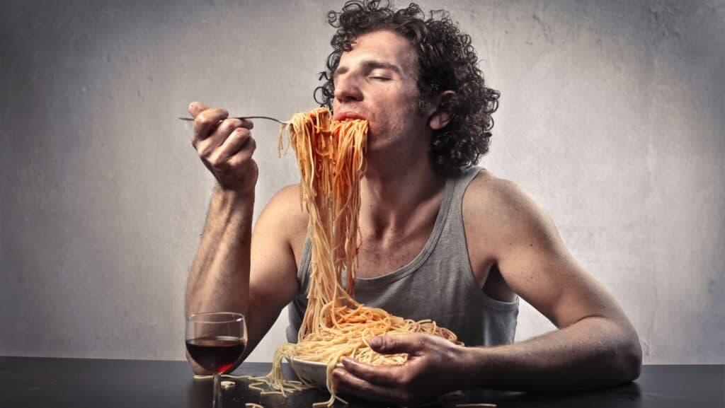 gorging on food.