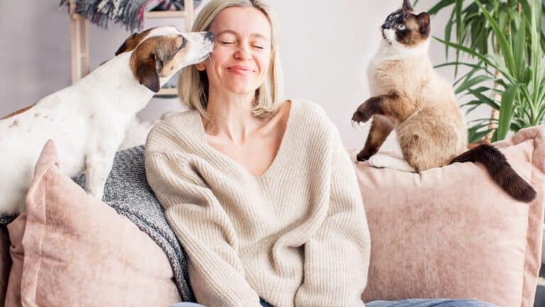 woman with cat and dog.