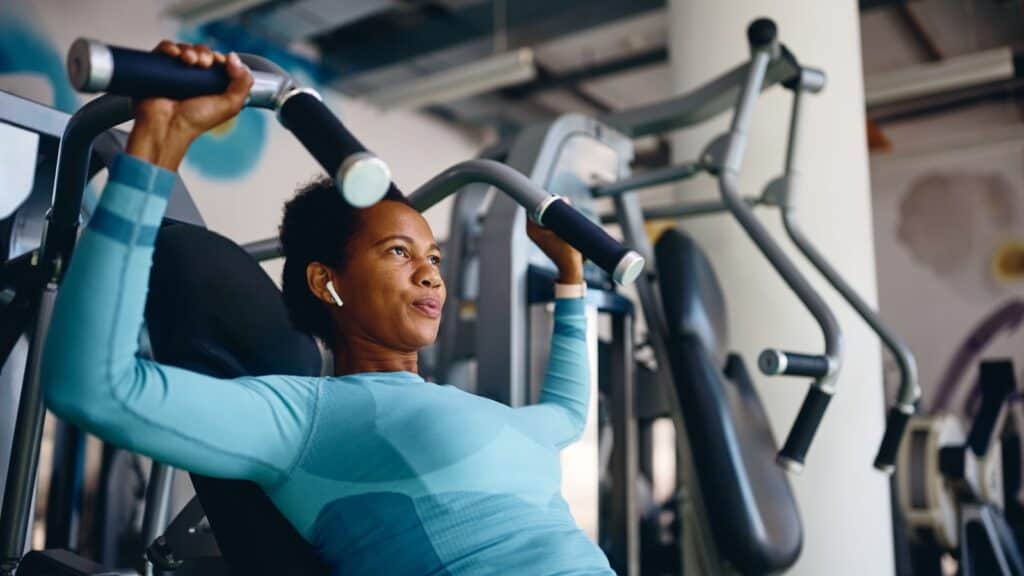 using machine at gym.