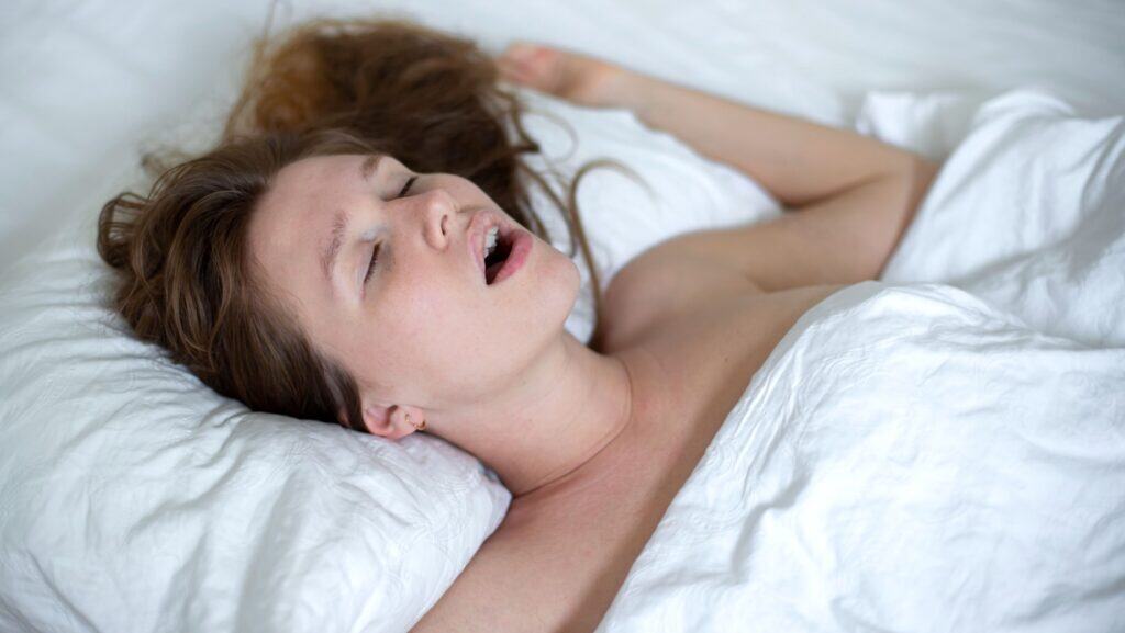 woman in bed.