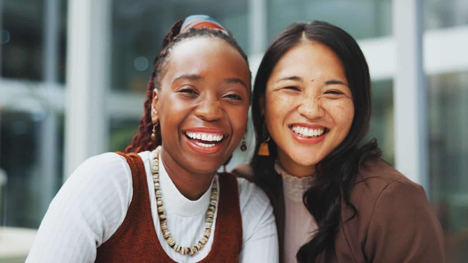 women at work smiling.
