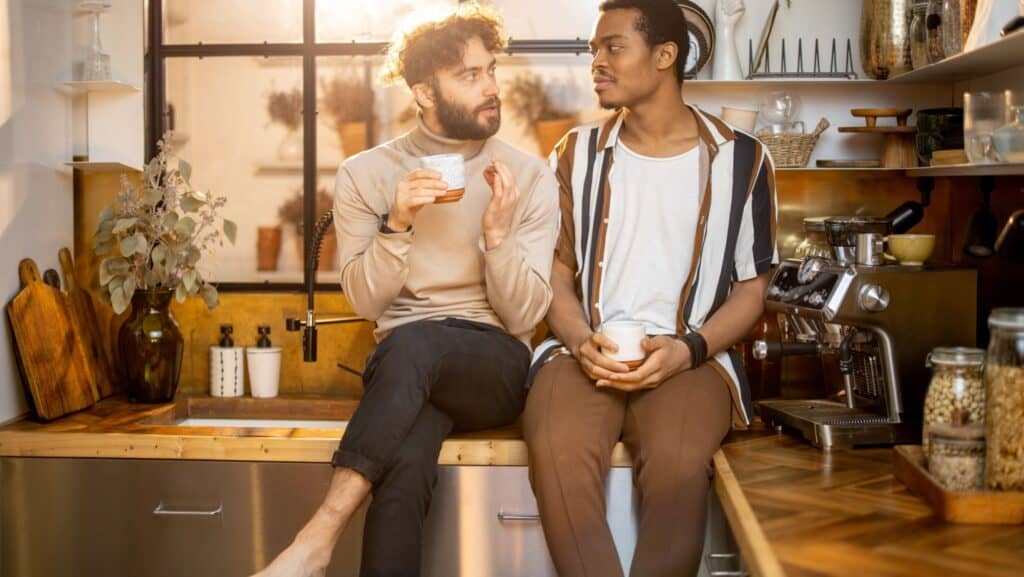 Two men talking. Gay men.