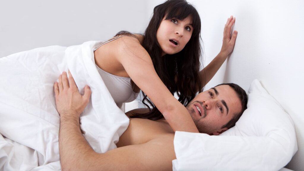 couple in bedroom.