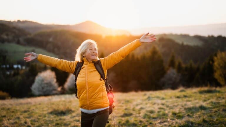 Happy senior hiker.