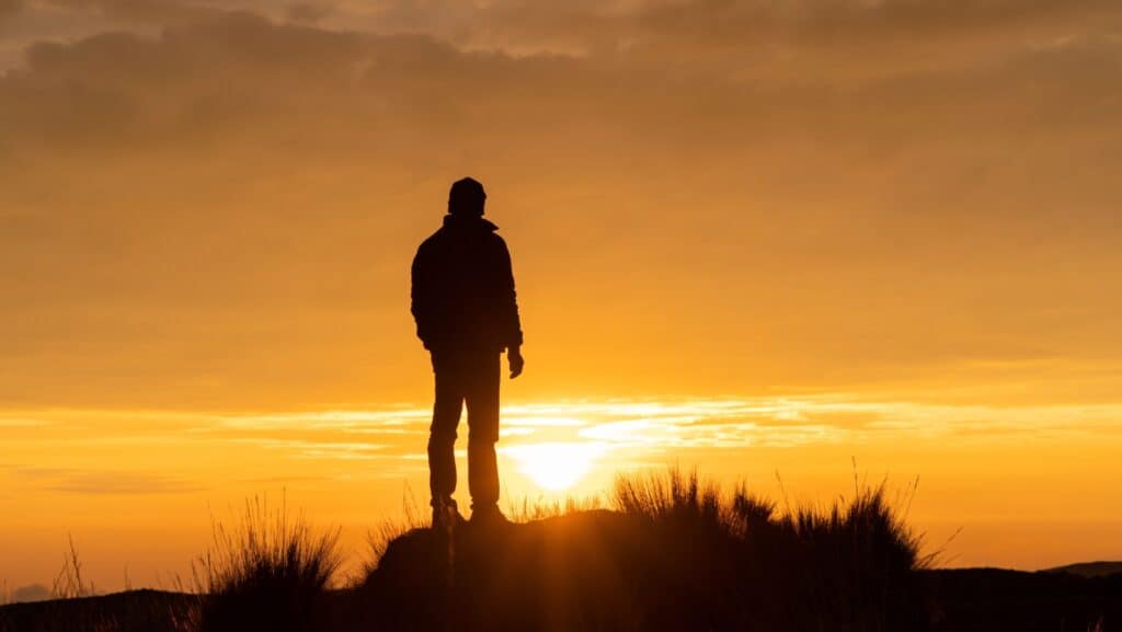 Sunset. lone man.