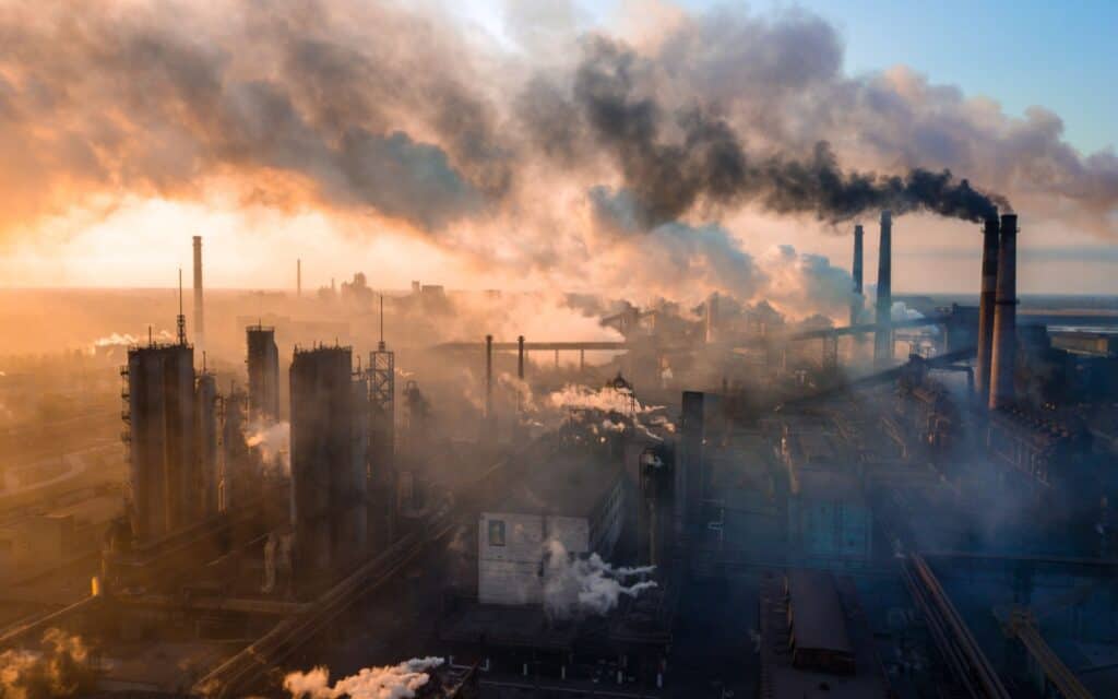 industry metallurgical plant dawn smoke smog emissions bad ecology aerial photography