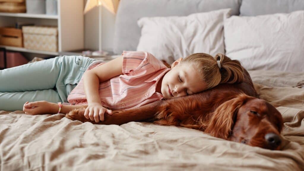 girl and dog sleeping. 