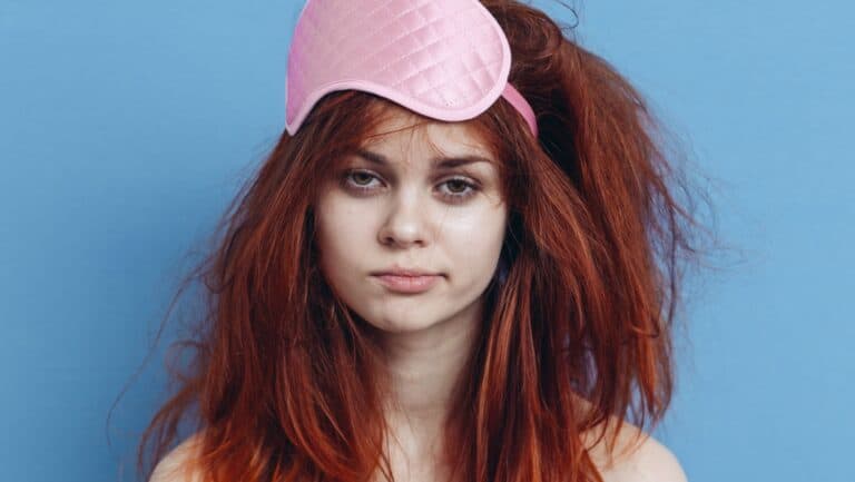 sleep in makeup. ViChizh via Shutterstock.