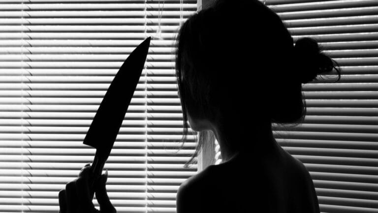 woman with knife.