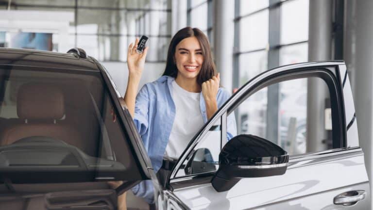 woman with new car.