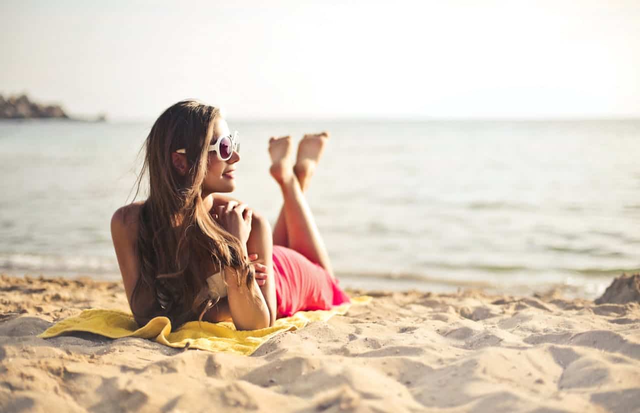 woman sunbathing.