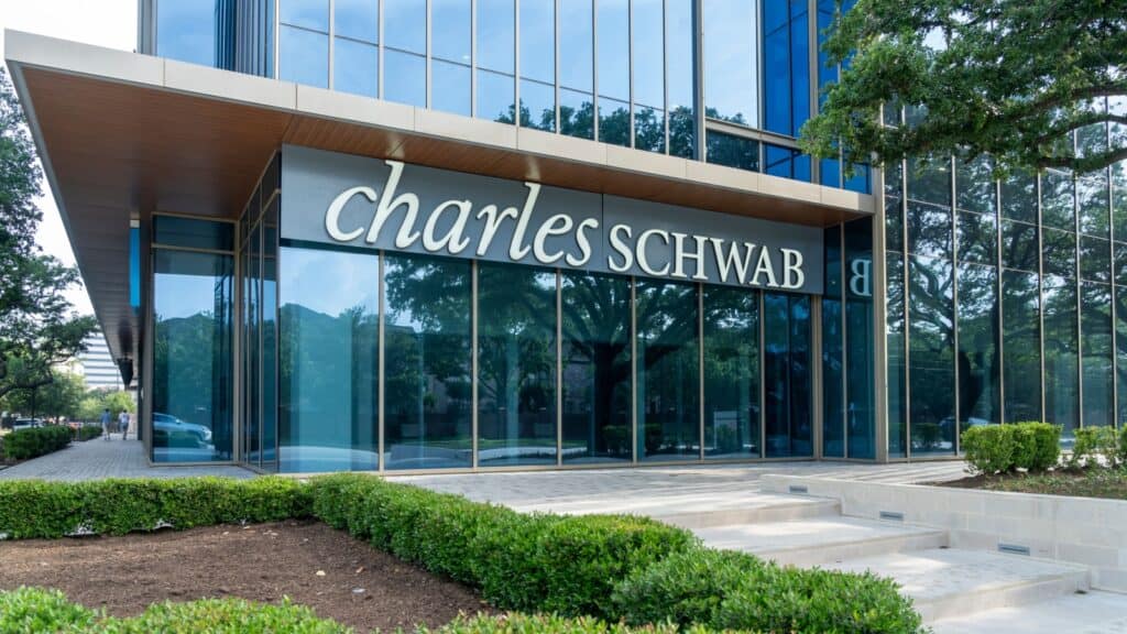Houston, Texas, USA - April 7, 2024: Charles Schwab logo sign at one of their offices in Houston, Texas, USA. The Charles Schwab Corporation is an American multinational financial services company.