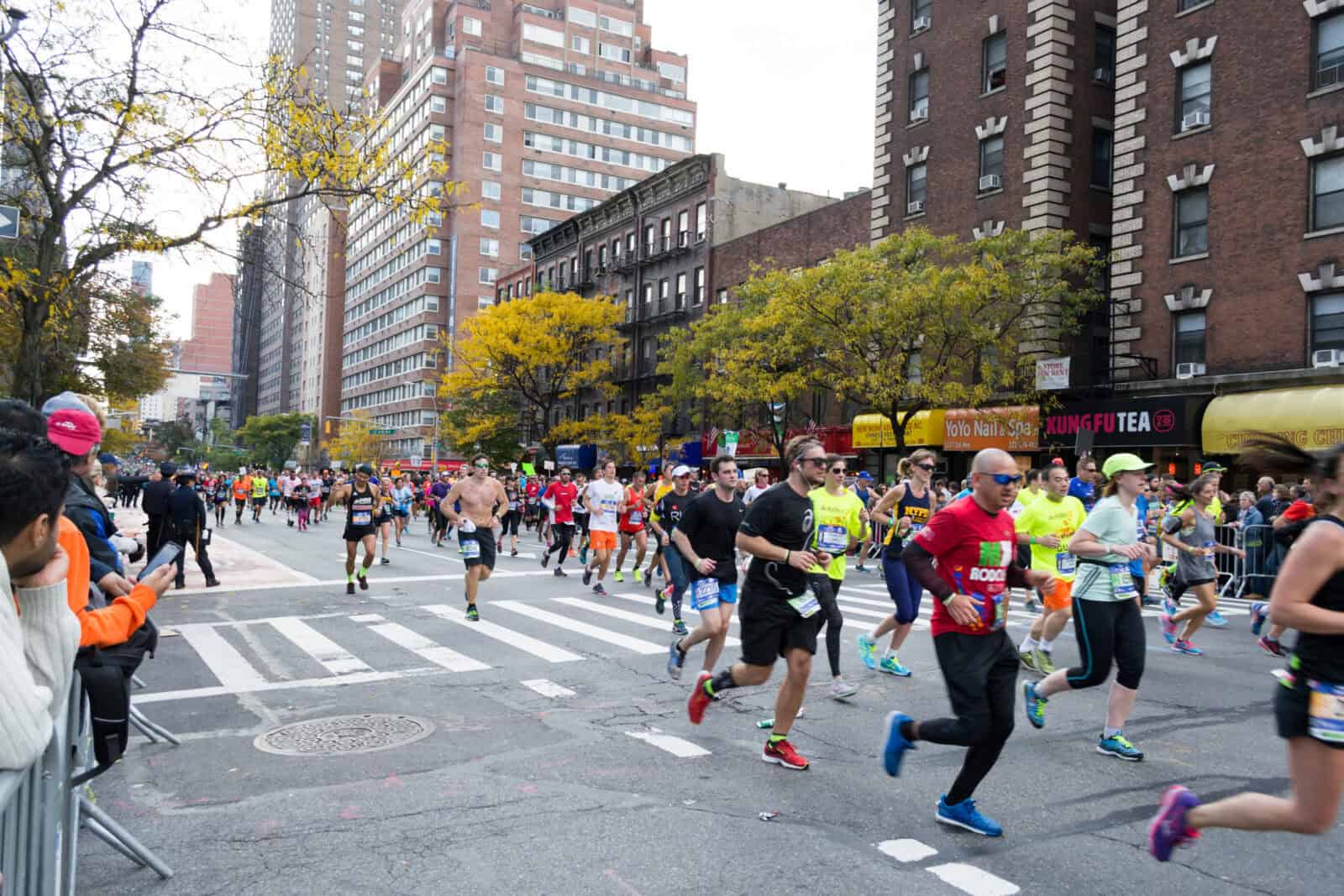 The NYC Marathon is the largest marathon in the world and passes through the 5 boroughs of the city.