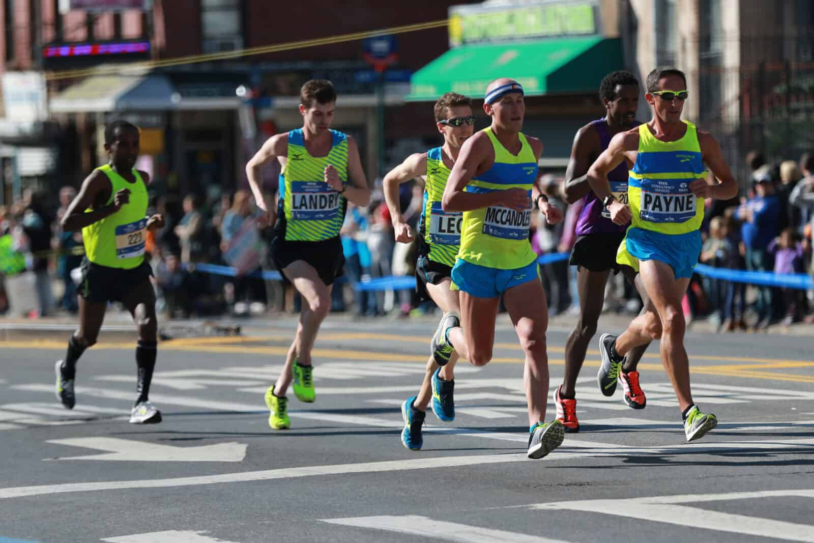 NEW YORK - NOVEMBER 6, 2016: New York City Marathon runners traverse 26.2 miles through all five NYC boroughs to the finish line in Central Park, Manhattan