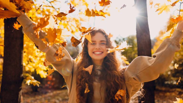 Young girl in Falling Leaves.
