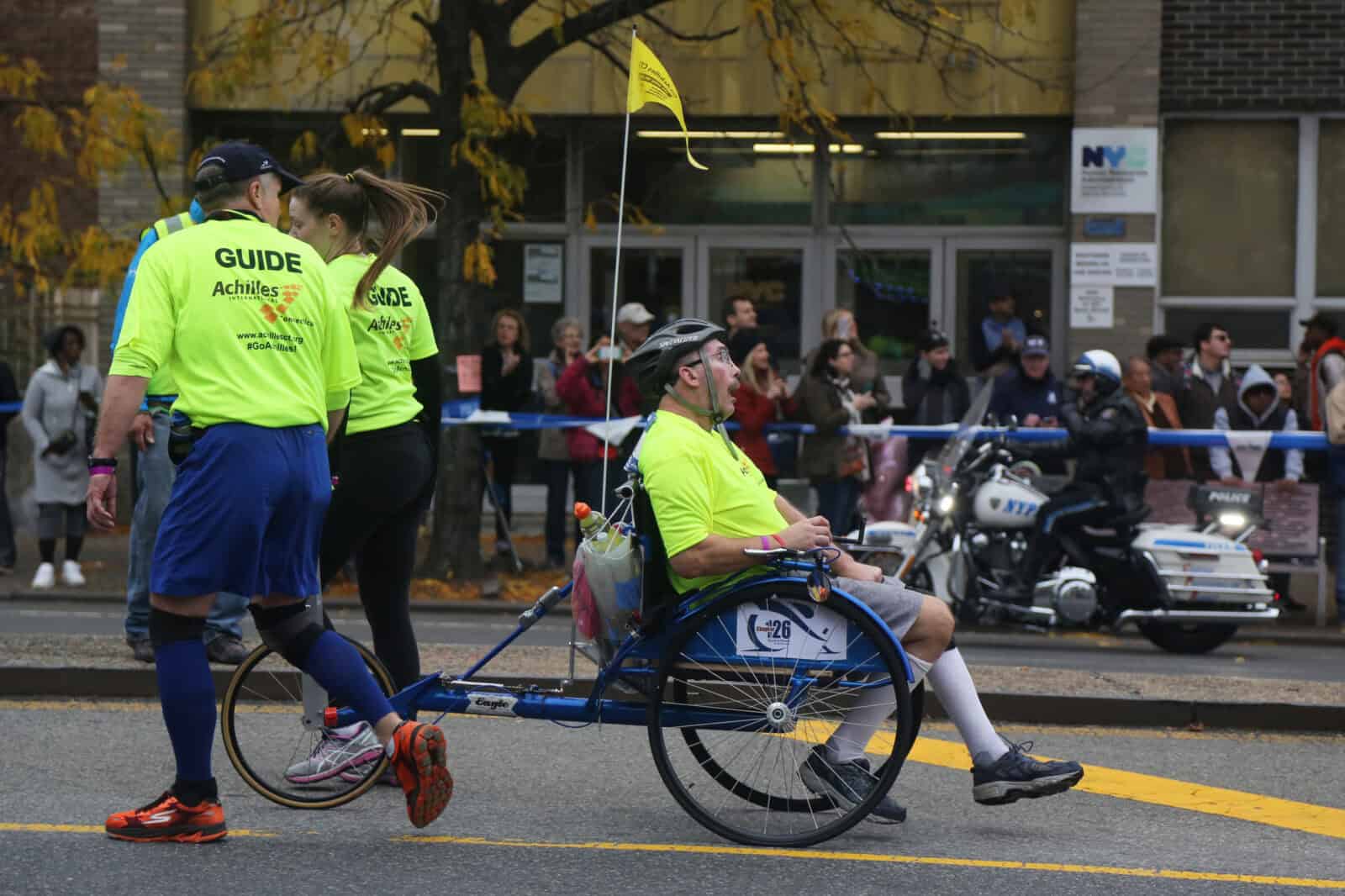 NEW YORK - NOVEMBER 5, 2017: New York City Marathon wheelchair division participants traverse 26.2 miles through all five NYC boroughs to the finish line in Central Park, Manhattan