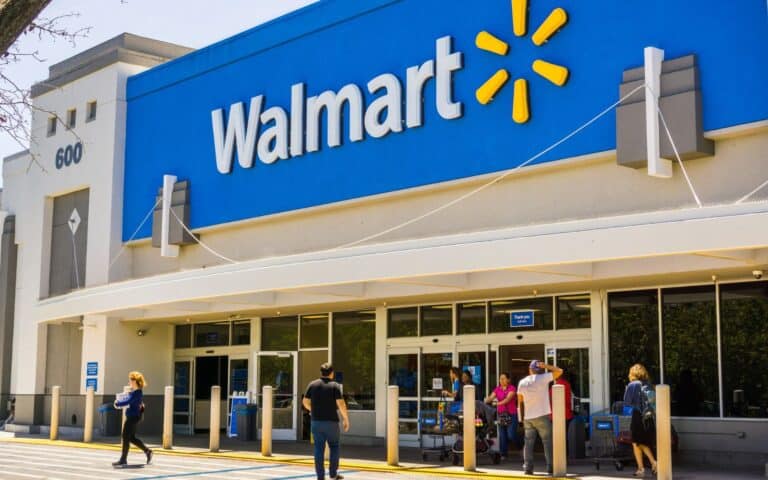 Mountain View / CA/ USA - People going in and coming out of a Walmart store on a sunny day, south San Francisco bay area