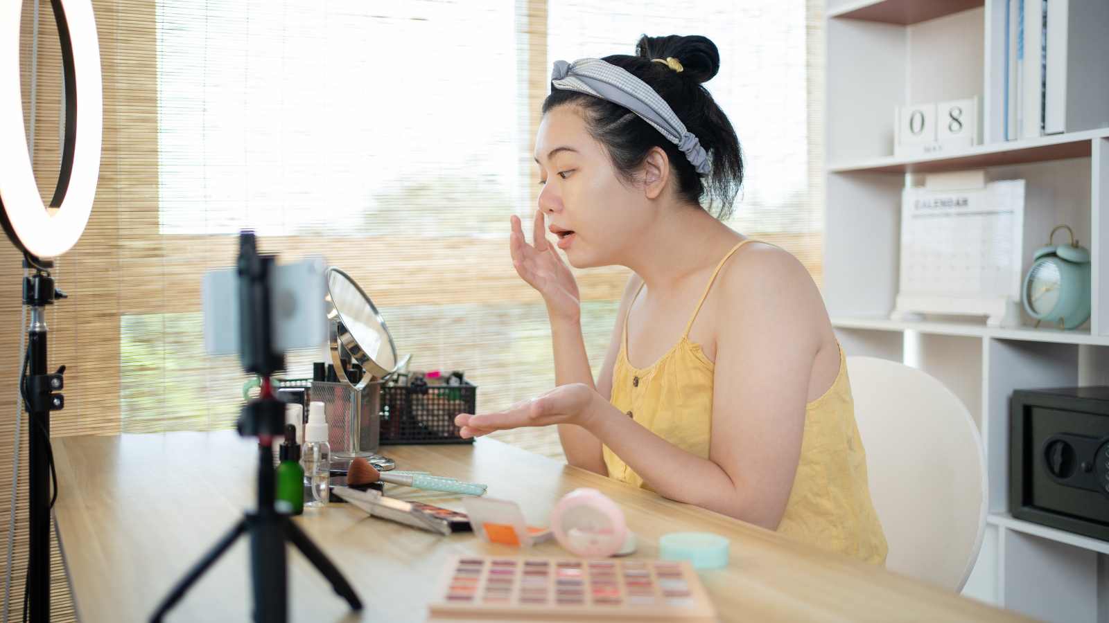 Woman making beauty content for her online fans