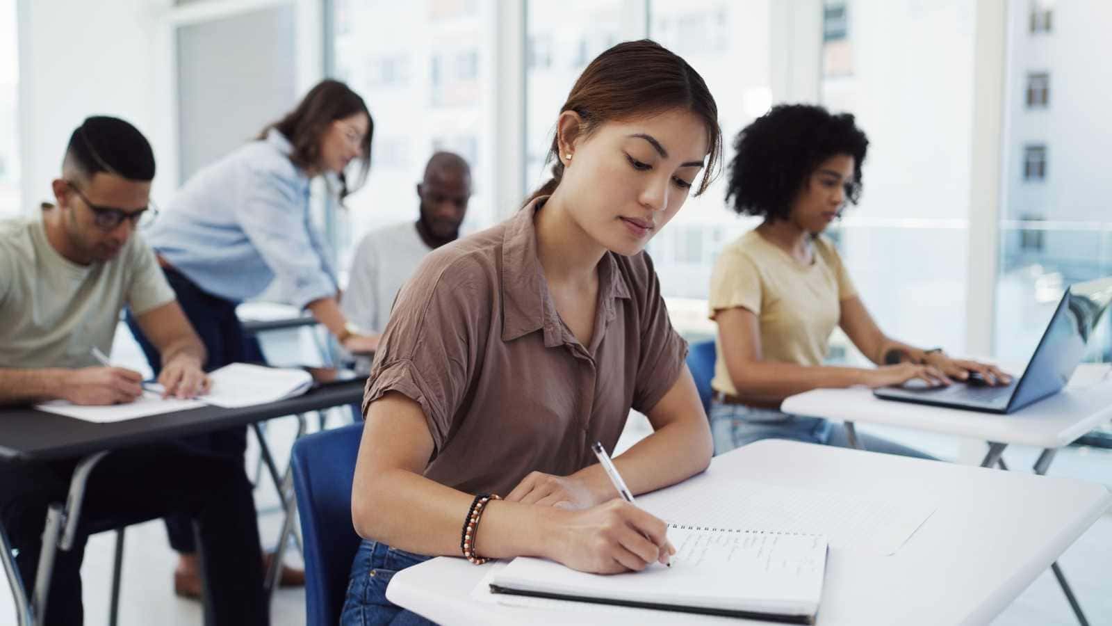 Woman and classmates learning