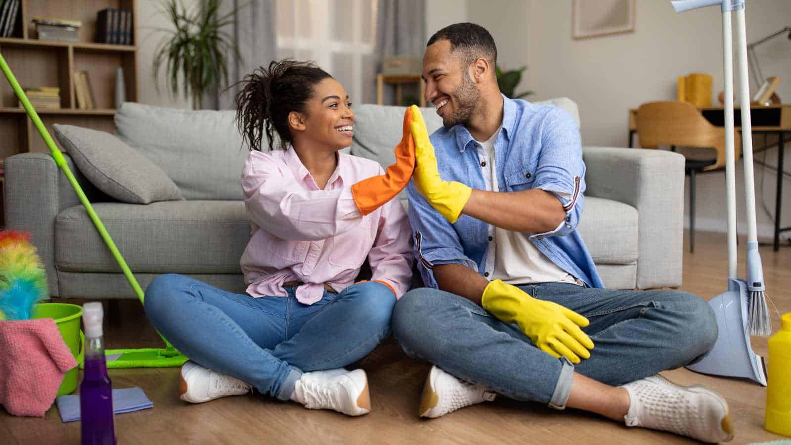 Young Couple Taking Break From House Chores