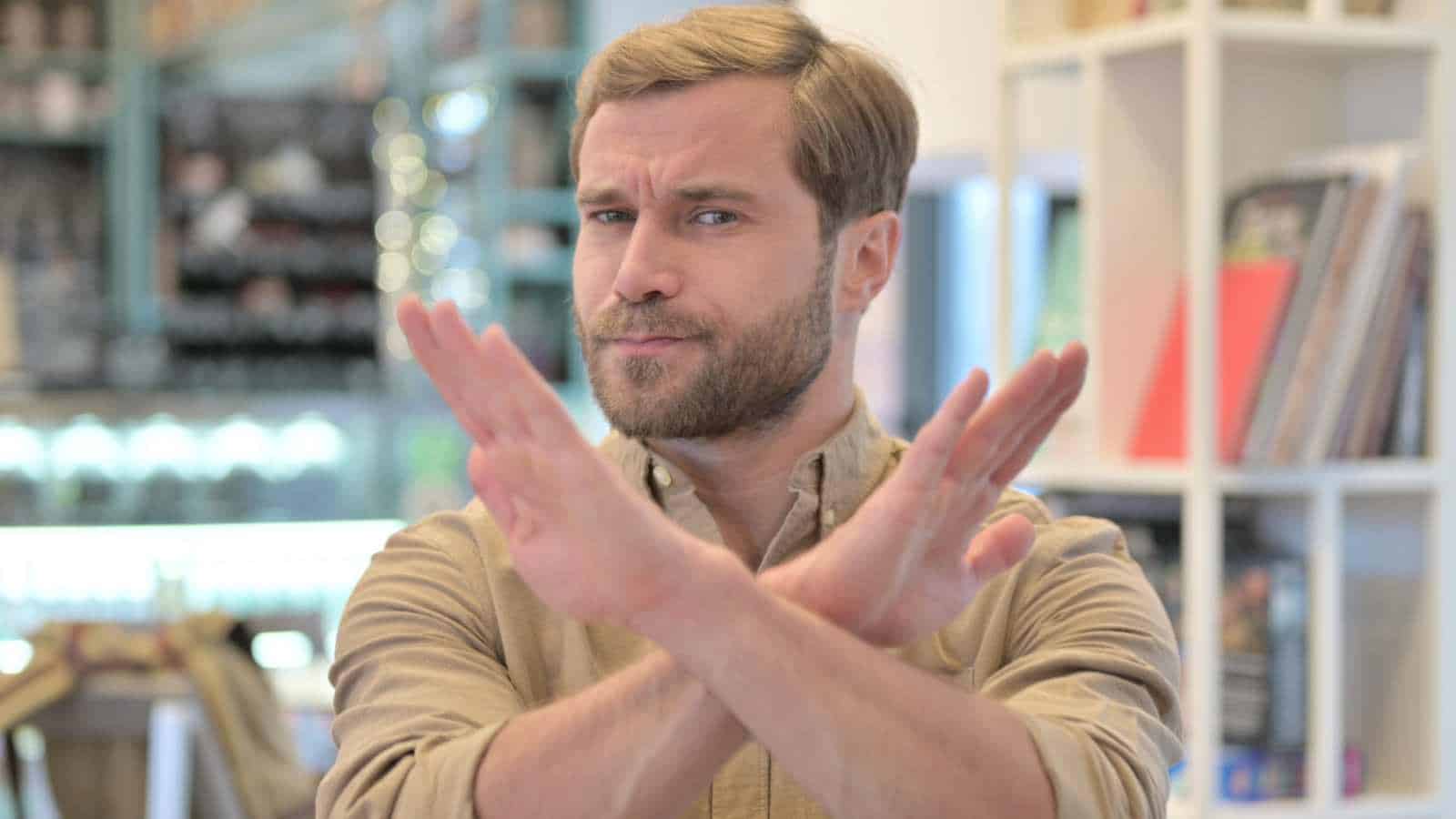 A man gesturing no