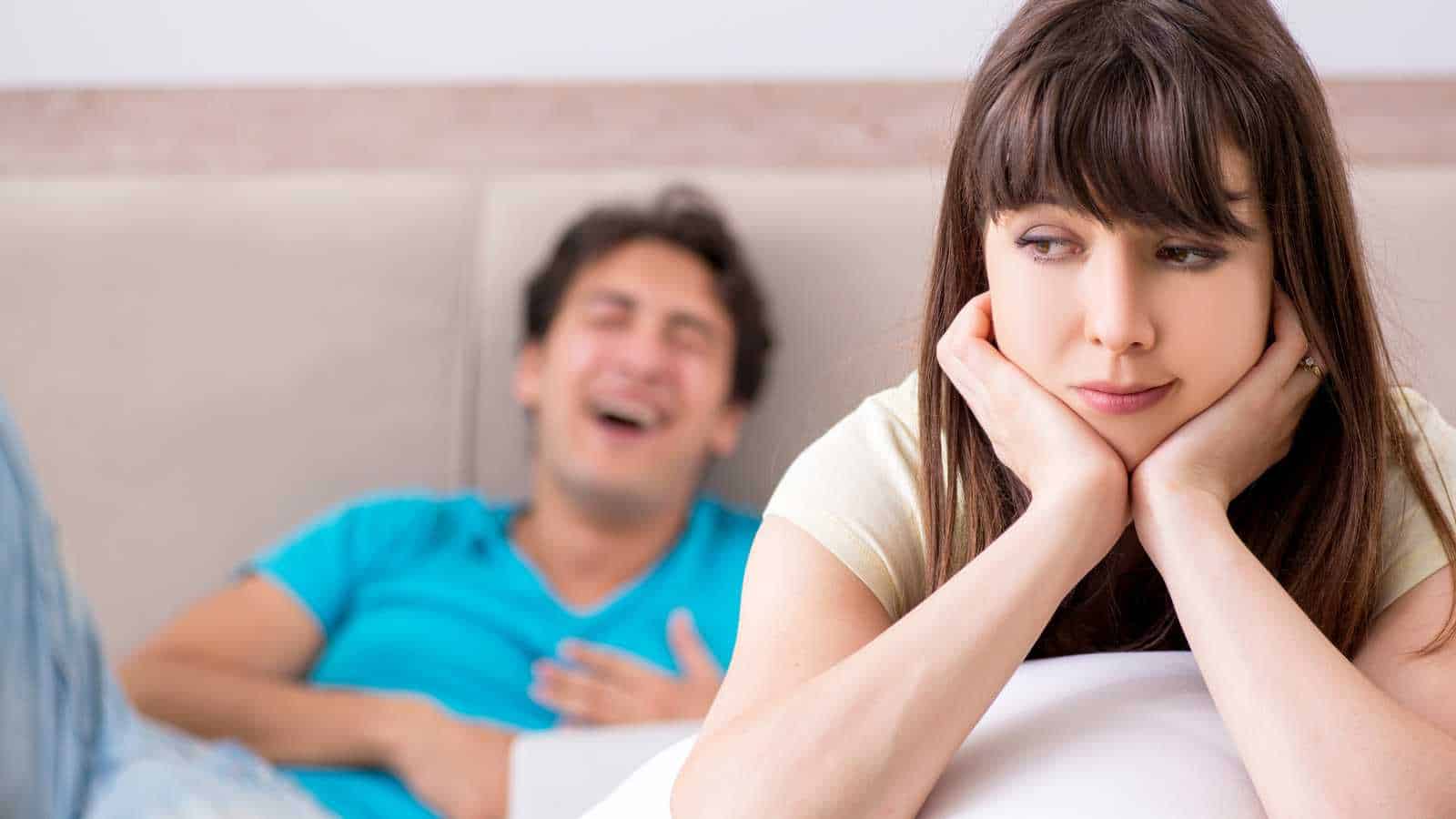 Sad Woman Sitting on The Bed