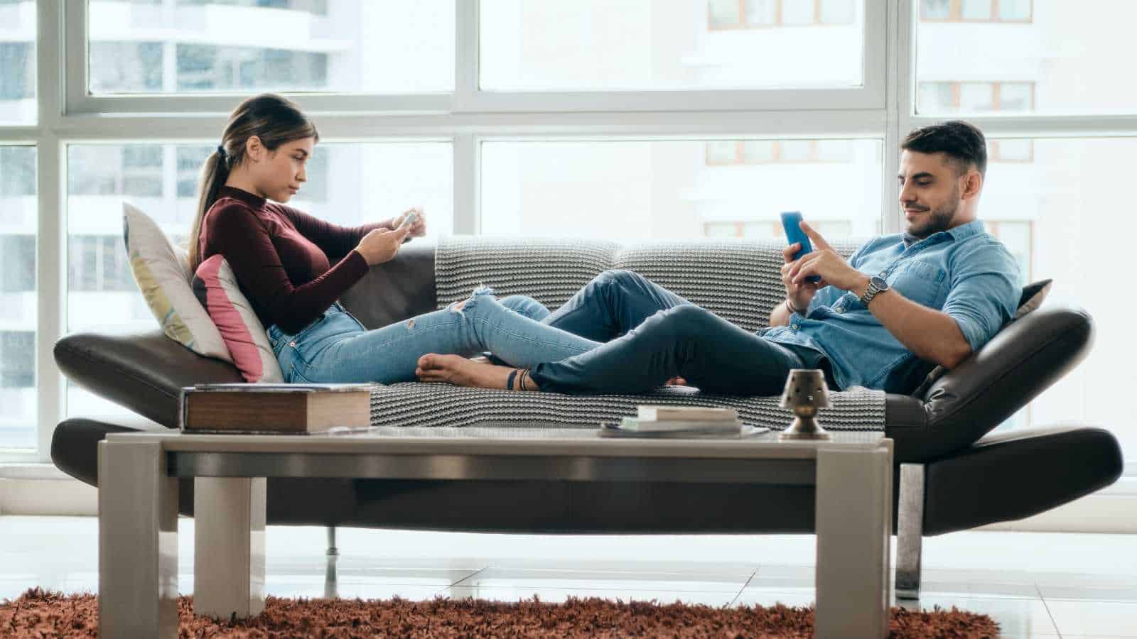 Bored couple taking each other for granted