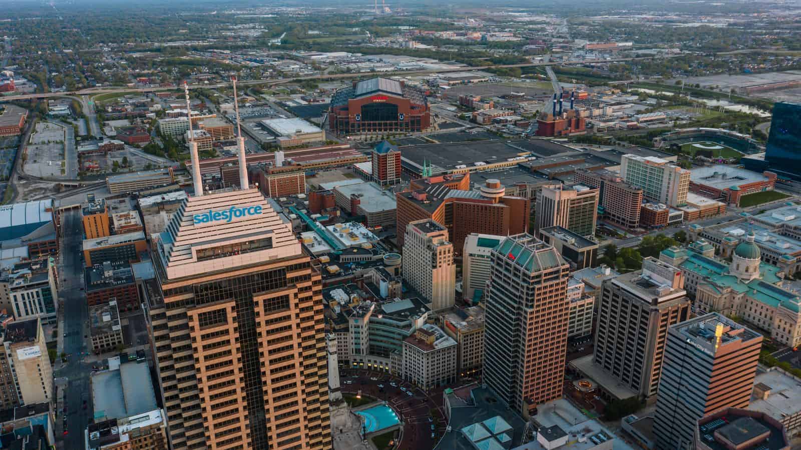 High-angle aerial view of Indianapolis skyline with iconic buildings and landmarks.