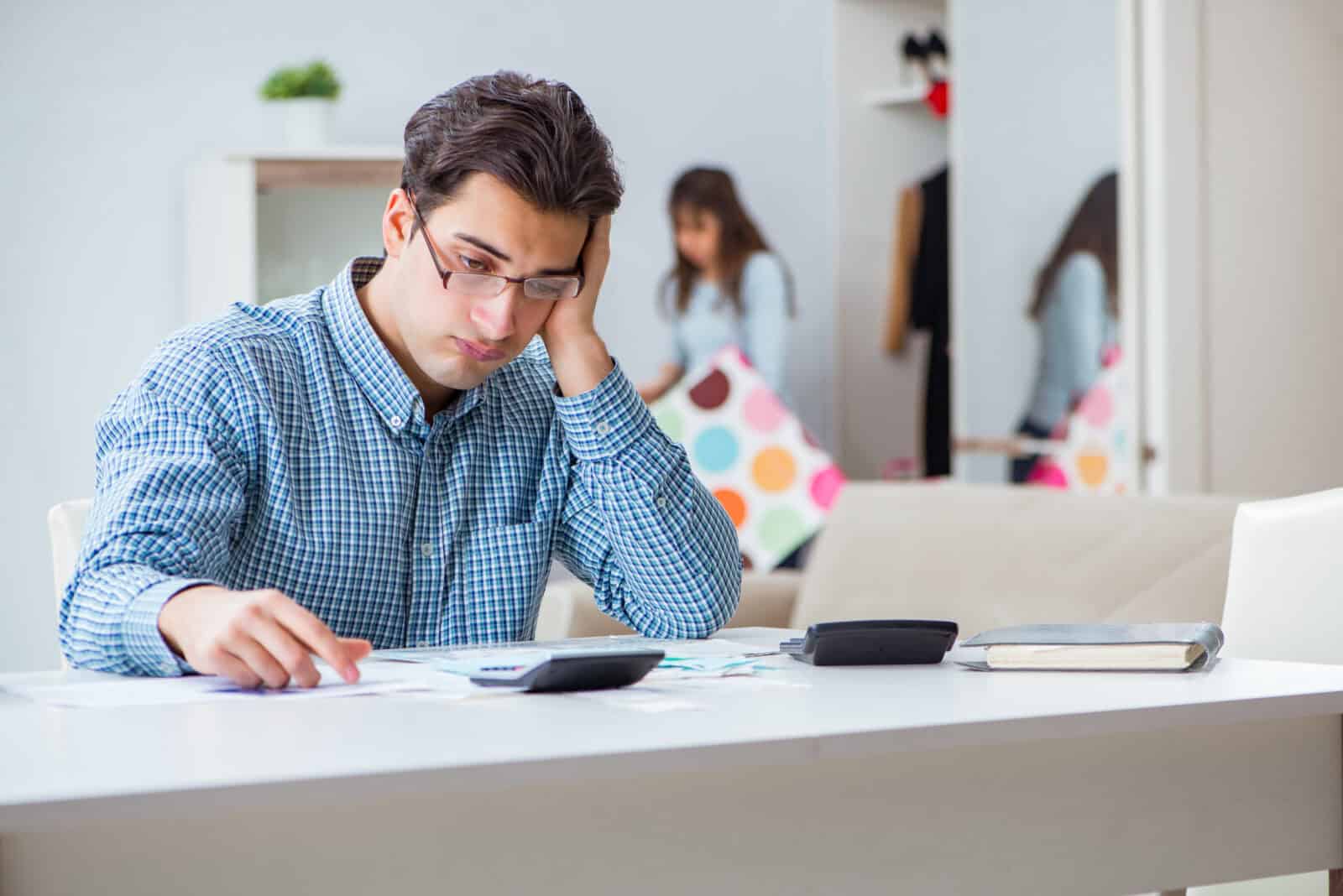 man hiding money problems from partner
