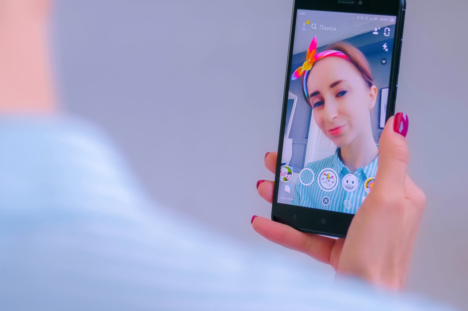 Woman using snapchat filters
