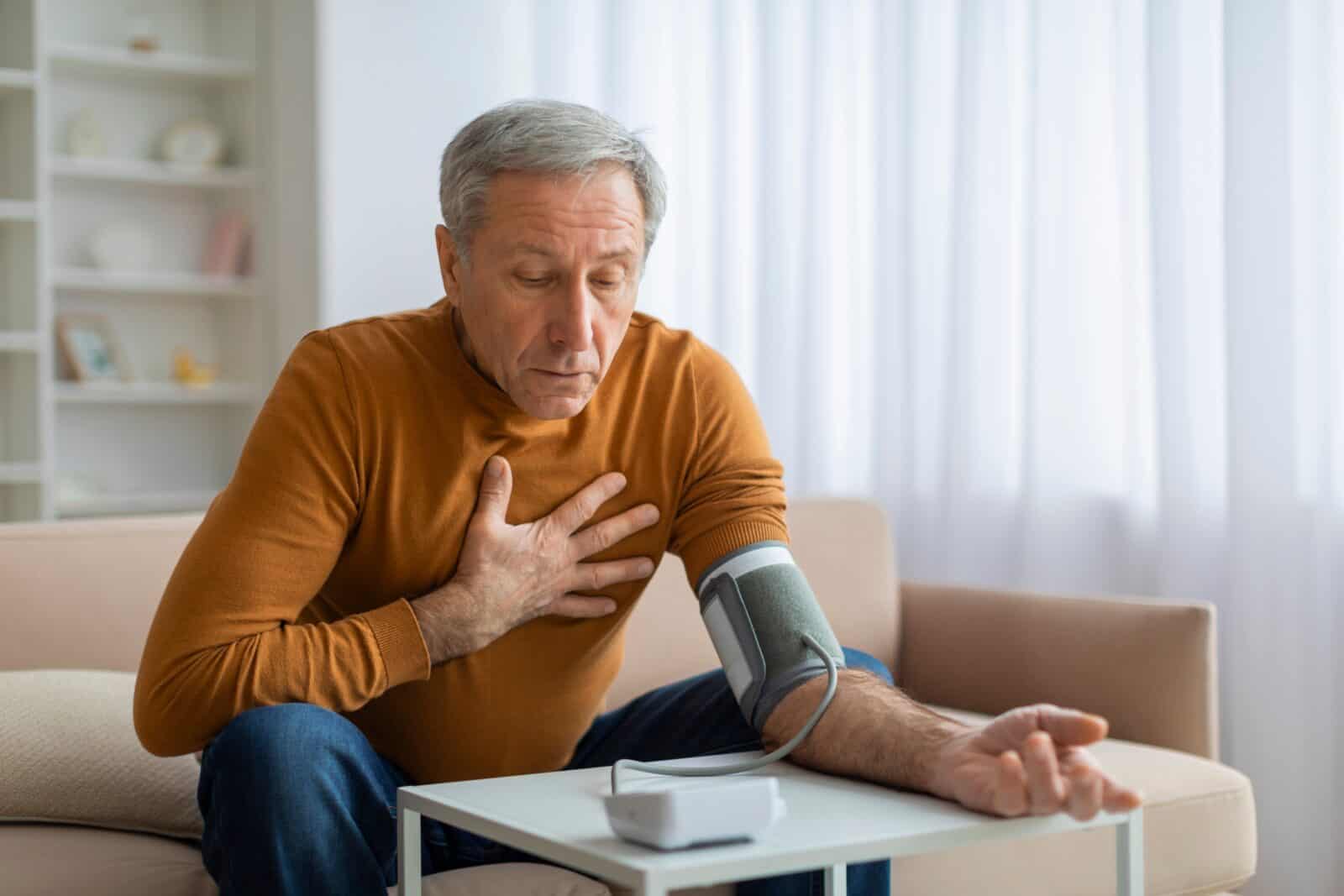 Man suffering from high blood pressure