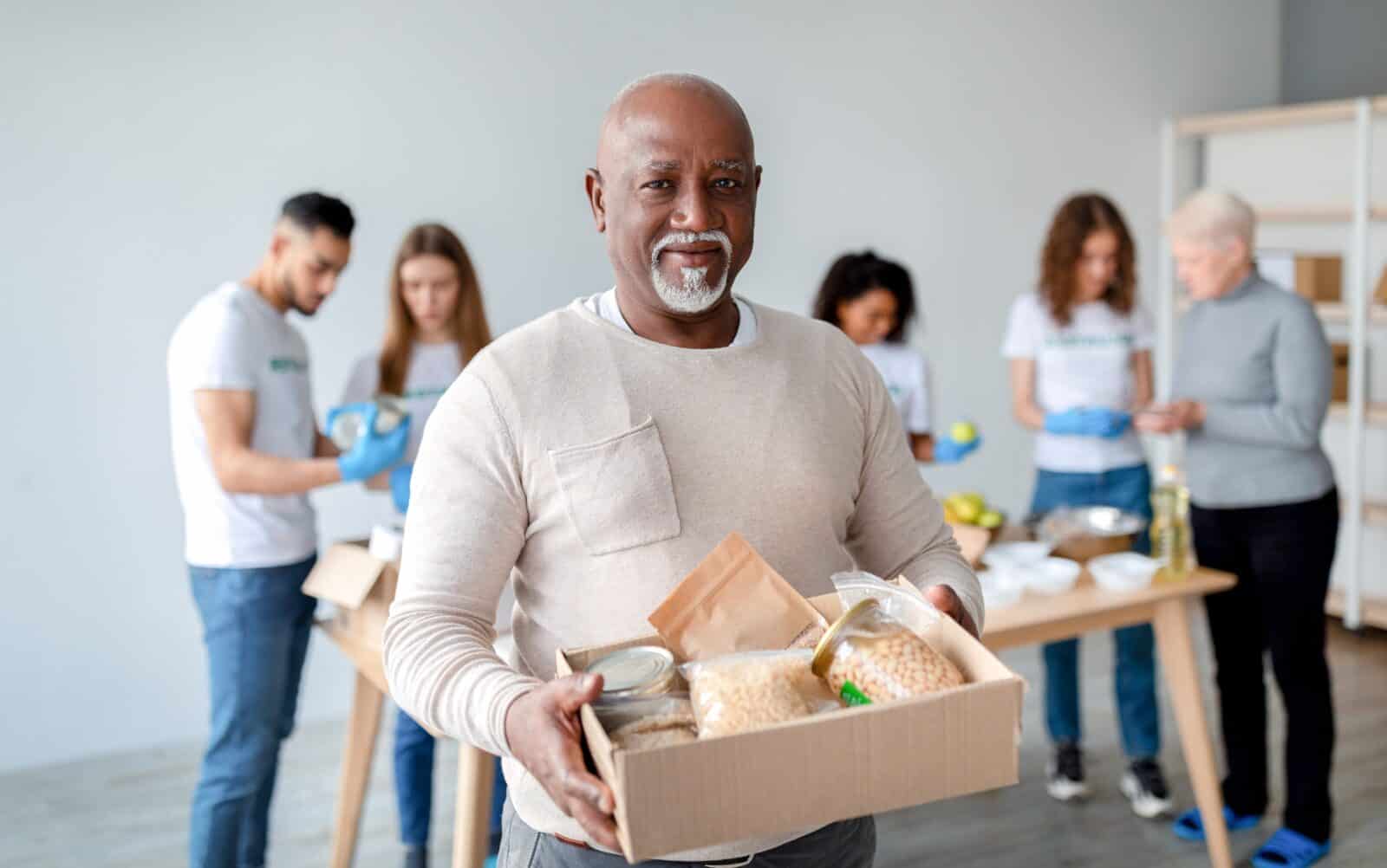 elderly man participating in charity work