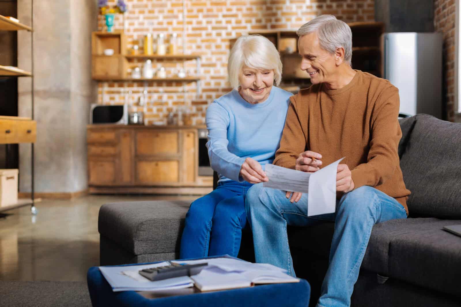 Elderly couple looking at their finances