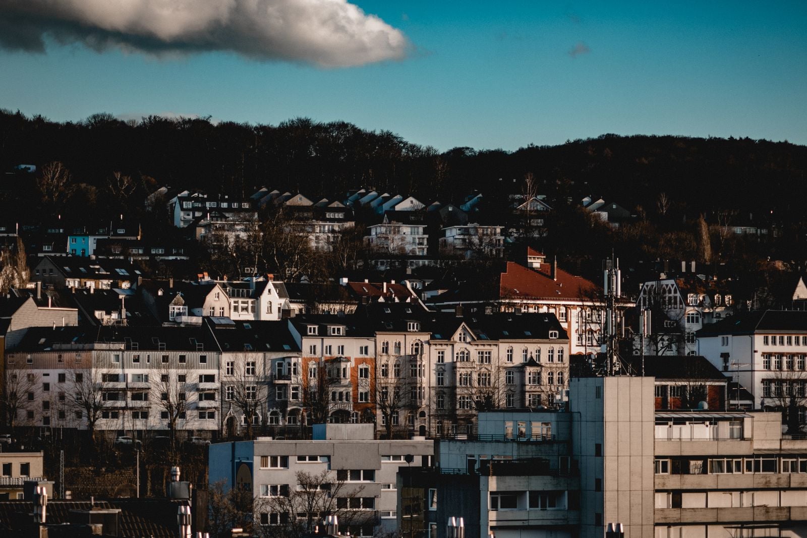 A picturesque view of urban architecture in Wuppertal, Germany, under a vibrant sky.