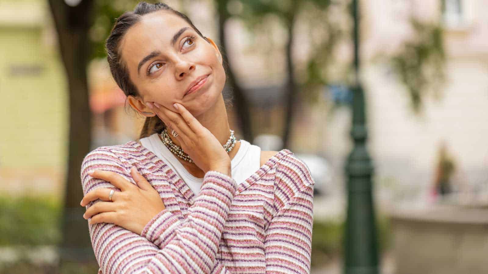 thoughtful woman with pensive expression