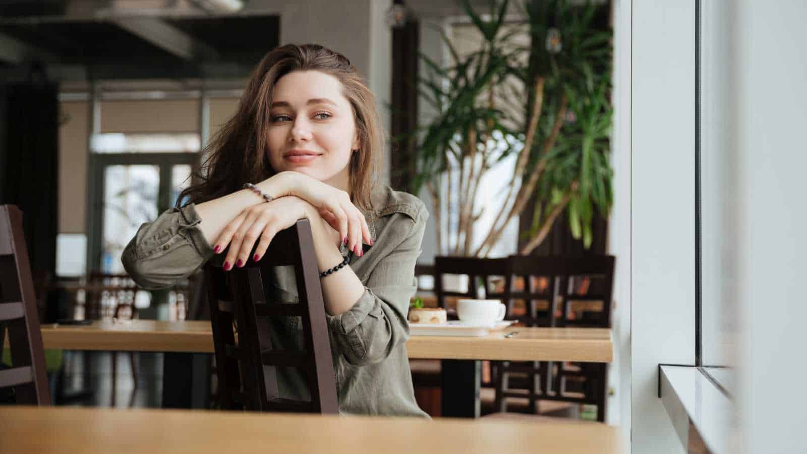 smiley thoughtful woman