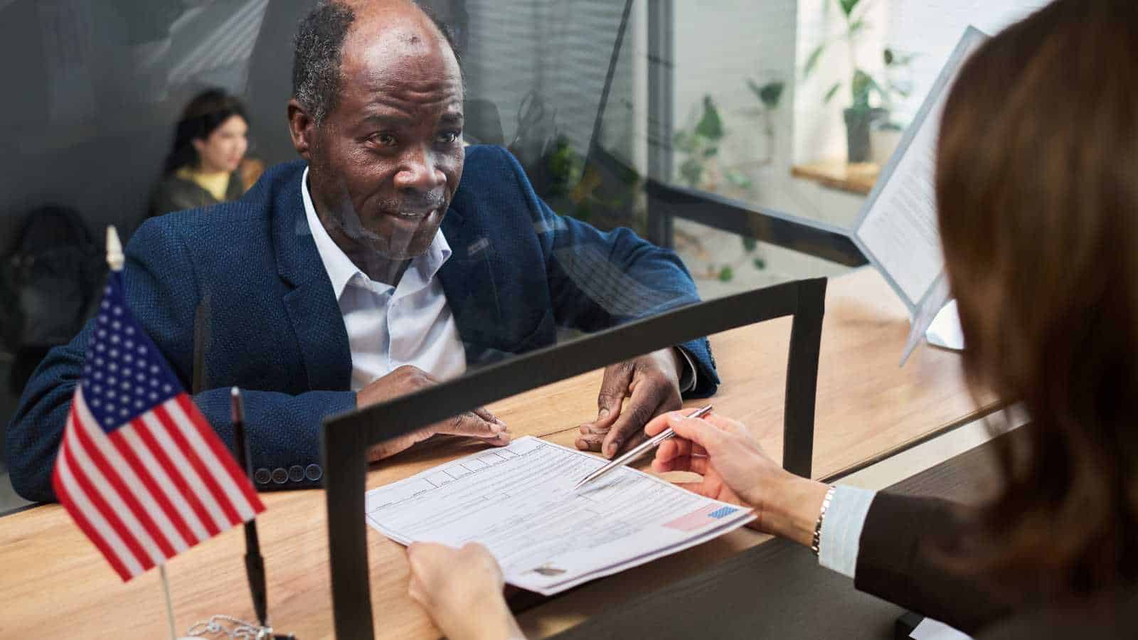 visitor filling in immigration form