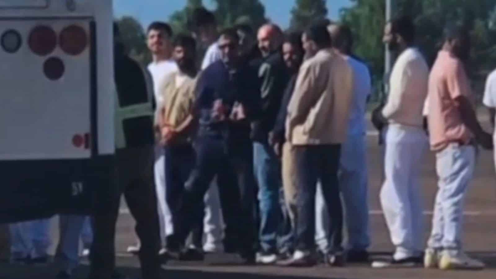Detainees lined up for deportation.