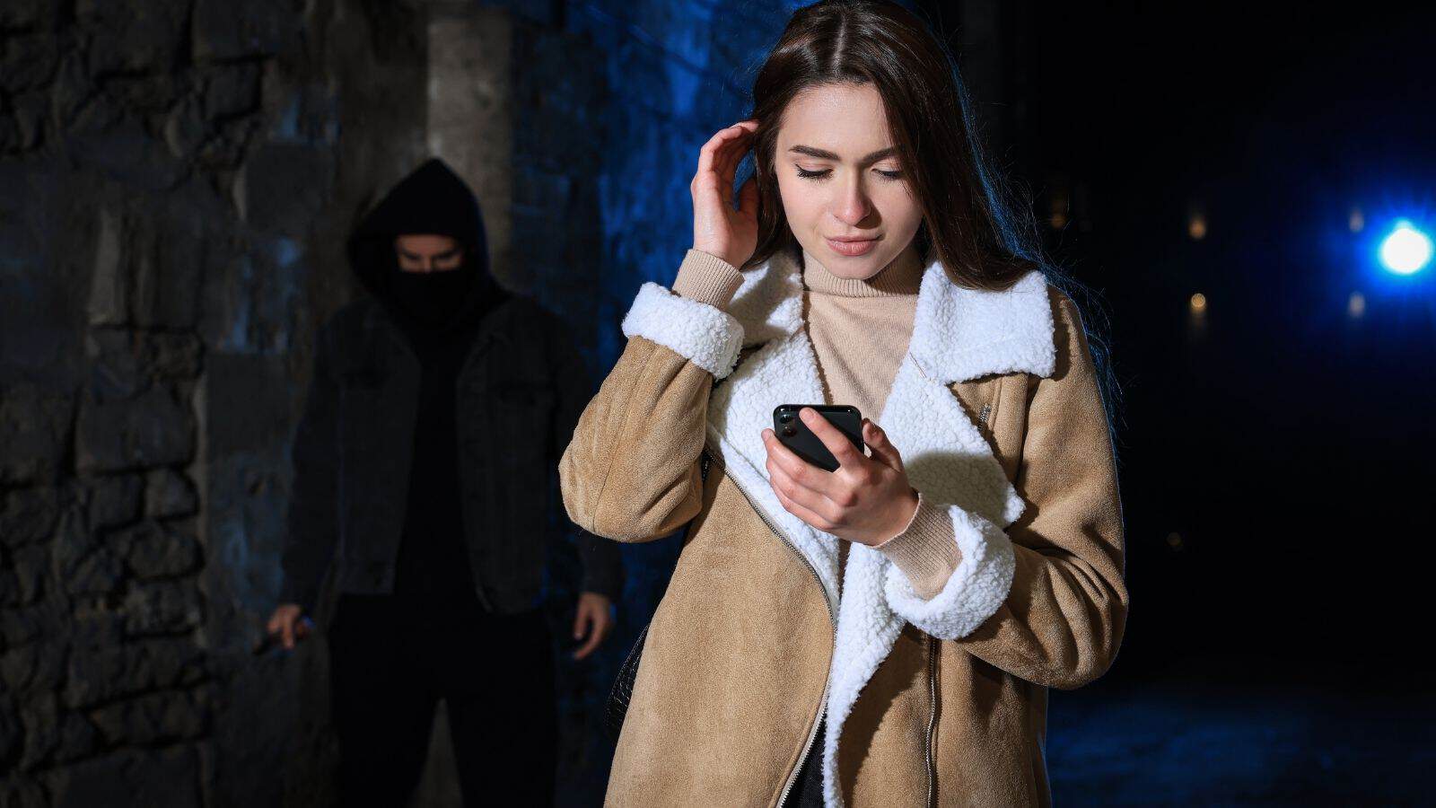 man stalking a woman